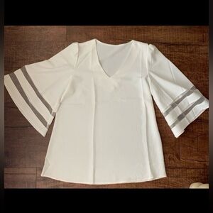 White bell sleeve blouse